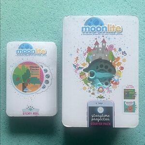 Moonlite Storytime Projector w/2 reels + extra Chicka Chicka Story Reel